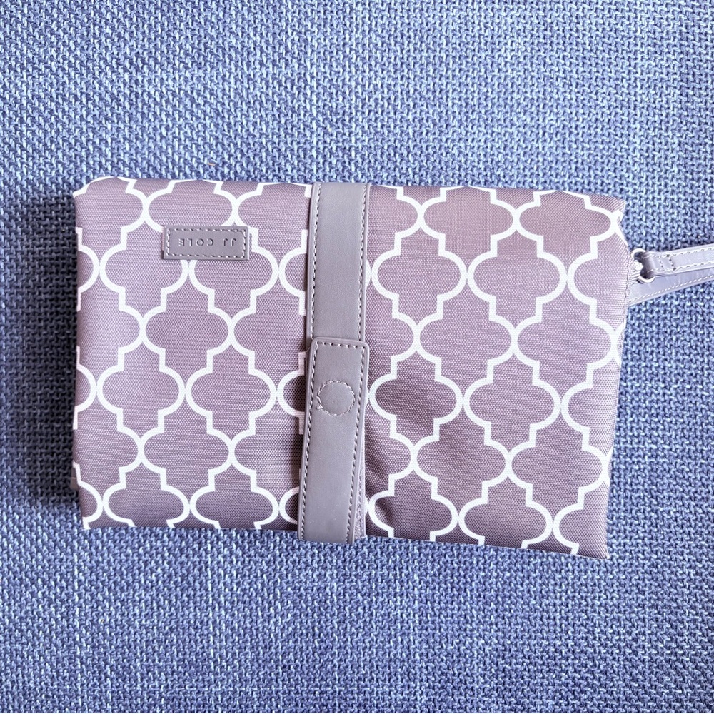Jj Cole diaper change clutch